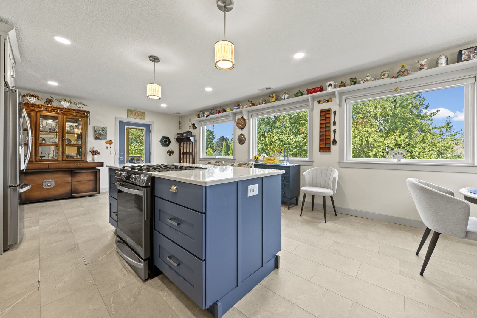 Kitchen with gas range and dining nook