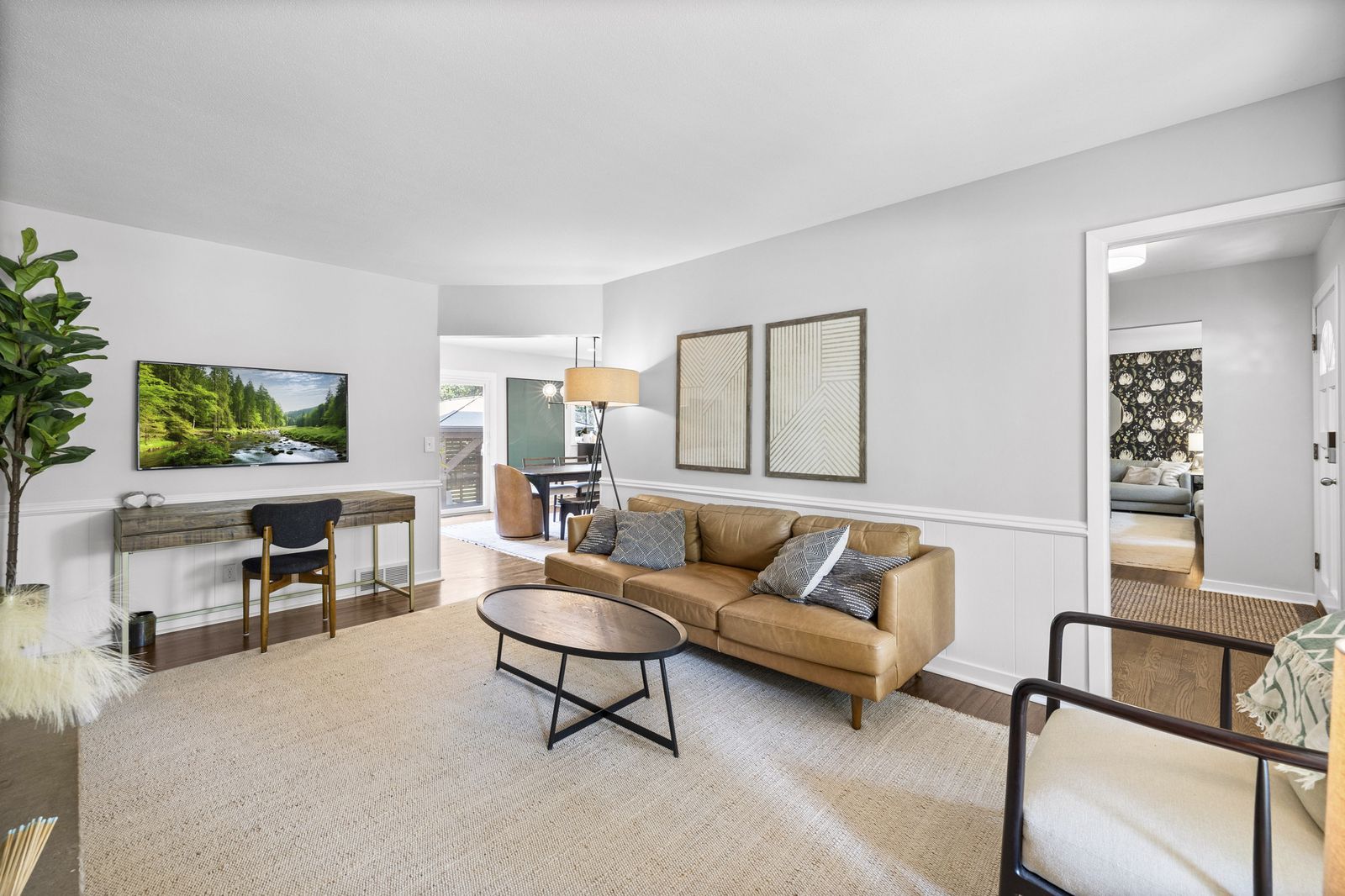 Living room with console table and artwork