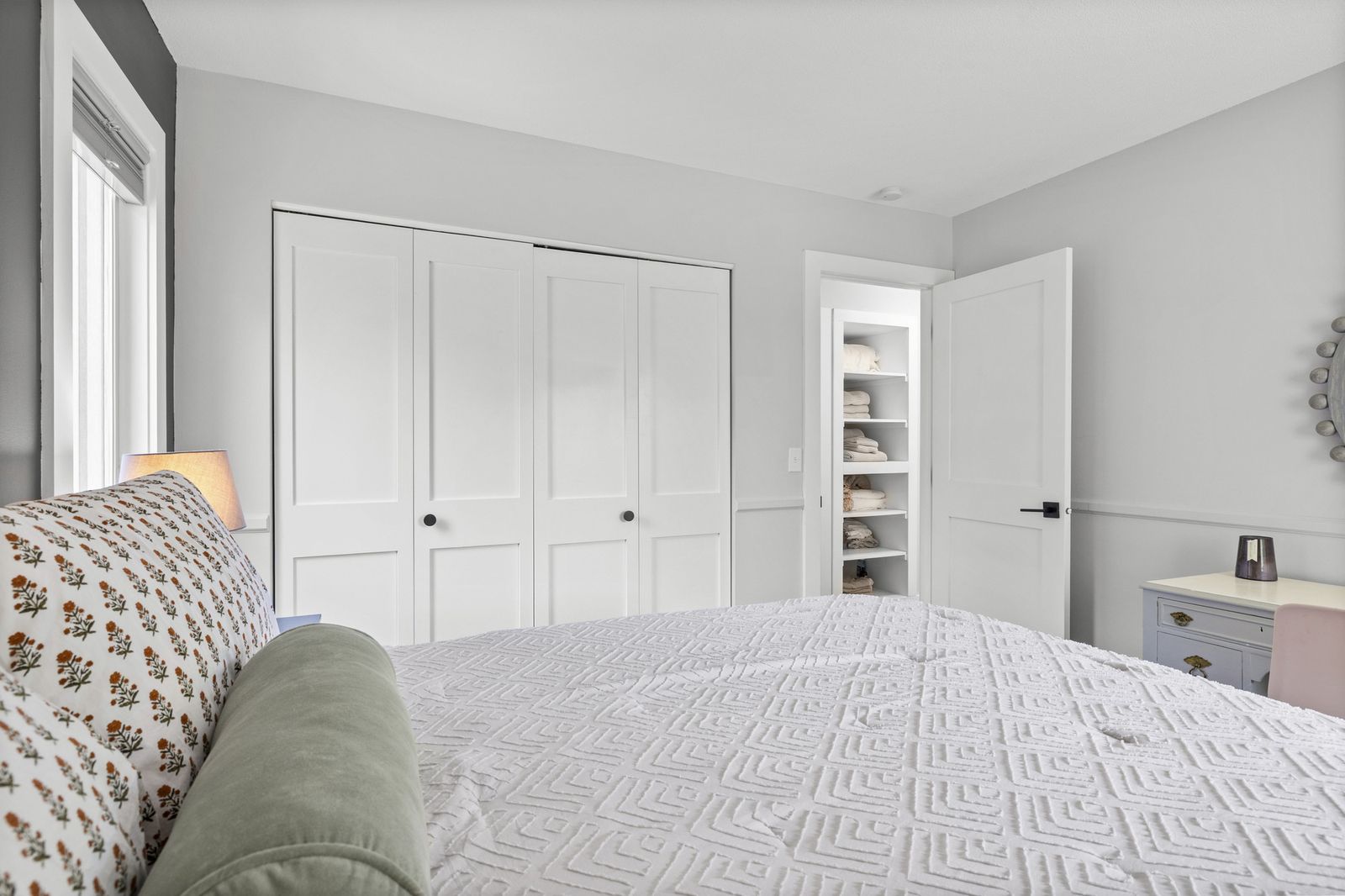 Bedroom with closet and bookshelf nook