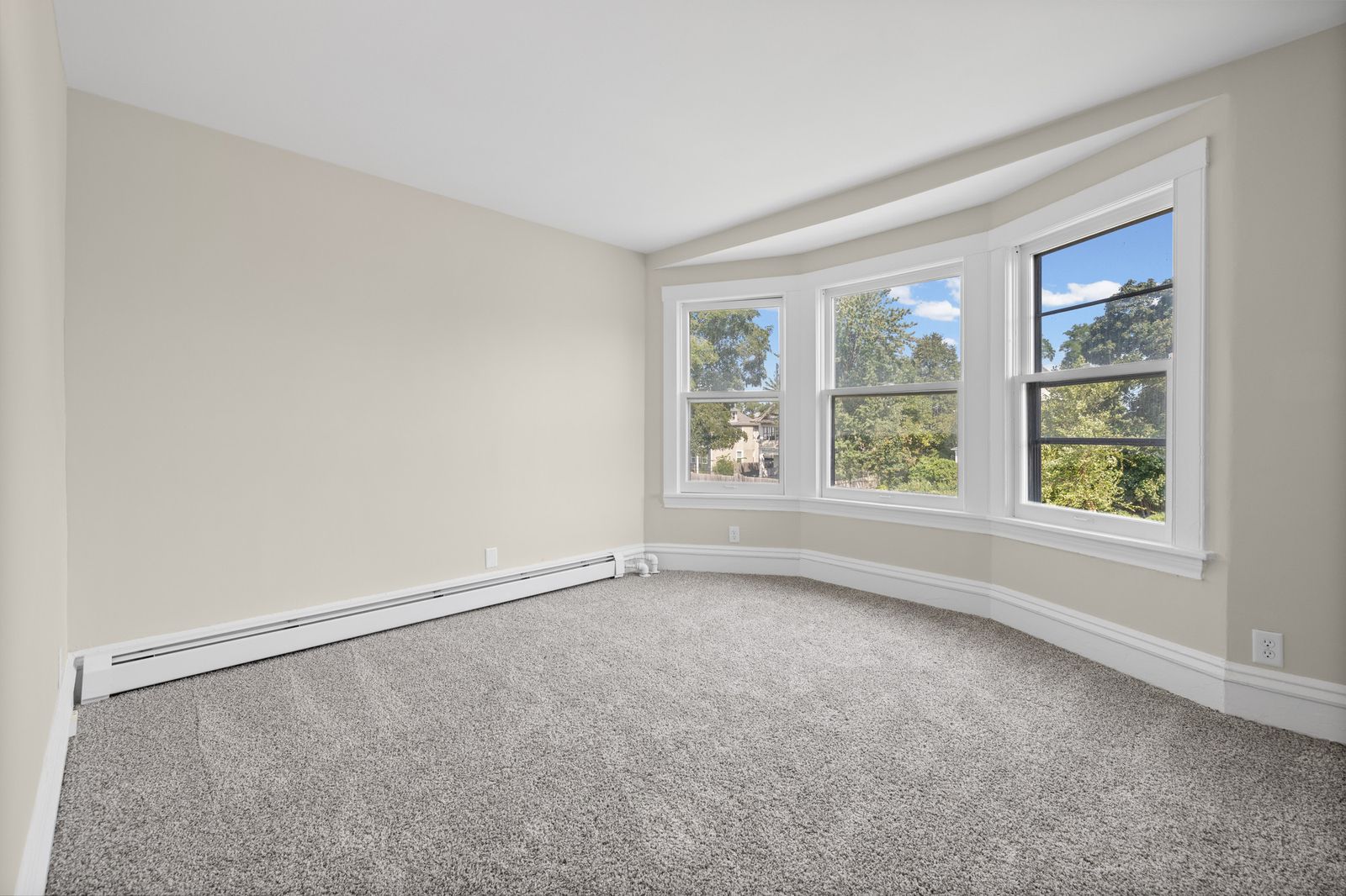 Upstairs bedroom with bay window